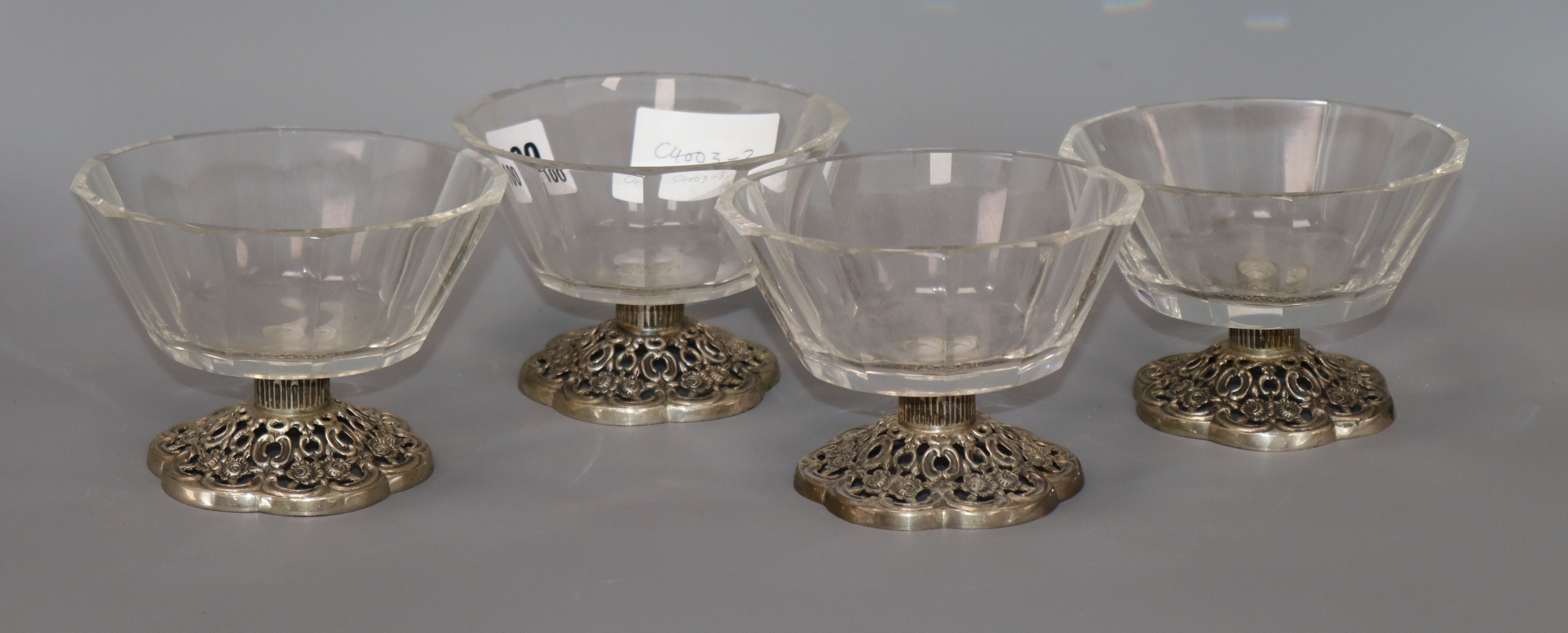 A set of four 835 white metal and glass dessert bowls, possibly by Villeroy & Boch