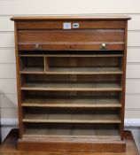 A 1920's teak tambour fronted filing cabinet H.76cm