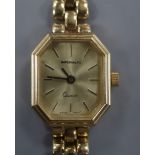 An 'Imperialto' ladies' 9ct gold quartz wristwatch on 9ct gold bracelet, gross 15 grams.