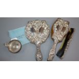 An American Art Nouveau sterling three piece dressing table set and a Tiffany & Co sterling taste