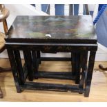 A nest of three Chinese polychrome lacquer occasional tables W.66cm