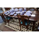 A Victorian style mahogany extending dining table with two leaves 230cm extended