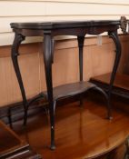 A late Victorian mahogany folding top card table, on cabriole legs W.62cm