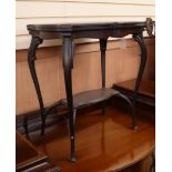 A late Victorian mahogany folding top card table, on cabriole legs W.62cm