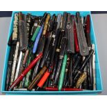 A large collection of vintage fountain pens, various makes