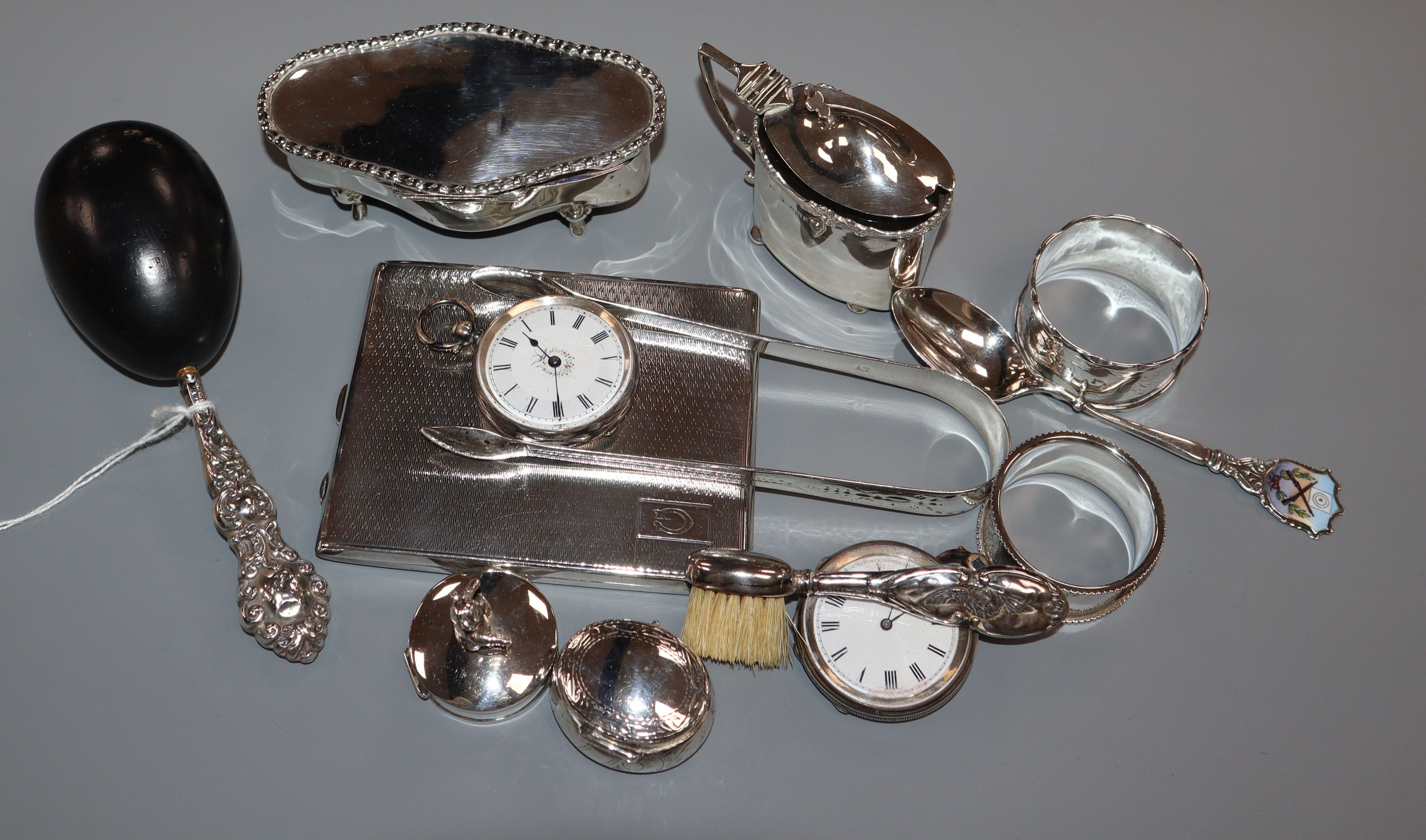 Mixed silver etc. including a silver cigarette case, silver mustard, trinket box, napkin rings,