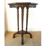 A Victorian mahogany octagonal table and a Liberty ebonised Hampden table Larger H.70cm