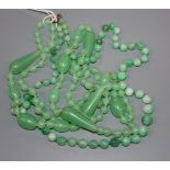 A single strand graduated jade bead necklace with 9ct gold clasp and a green paste necklace.