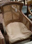 A Regency bergere library chair (a.f.)