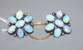 A pair of white metal and white opal cluster floral earrings and a small 22 ct gold band.
