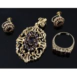 A modern Victorian style suite of 9ct and garnet set jewellery, comprising a ring, pendant and