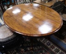 A Victorian rosewood oval breakfast table W.146cm