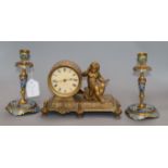 A pair of champleve enamel candlesticks and a gilt mantel clock candlesticks 18cm