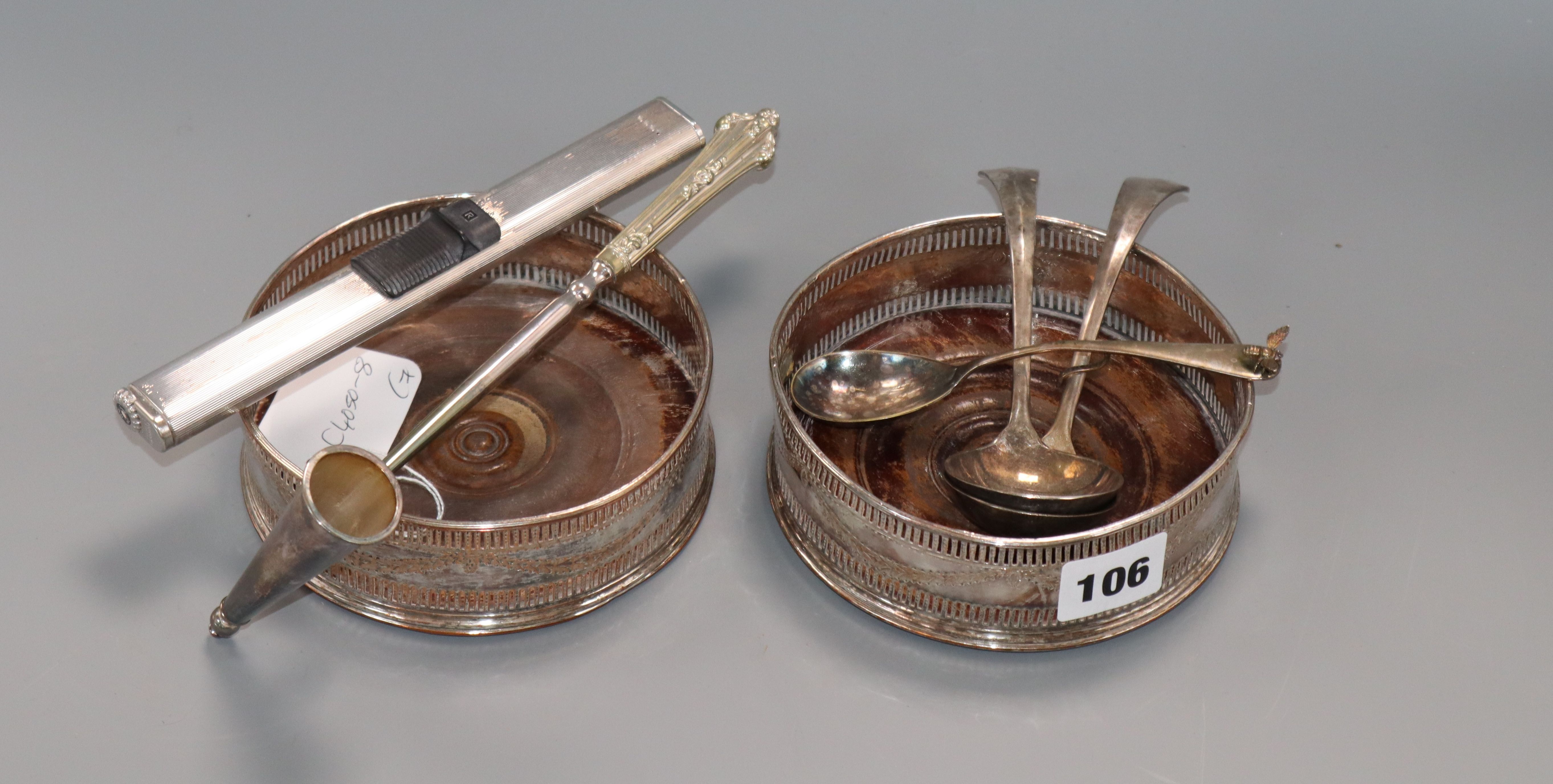 A pair of 19th century plated wine coasters and five other items, including candle extinguisher.