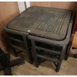 A weathered teak garden table and four chairs Table W.84cm