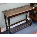 A 17th century and later oak table W.96cm