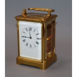 A gilt brass carriage timepiece