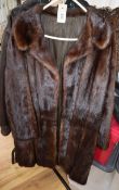 A three quarter length mink coat