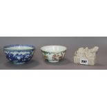 A Chinese famille rose bowl, Guangxu mark, a blue and white bowl and a Qing type brush rest