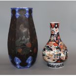 A 19th century Japanese Imari bottle vase and a Japanese lacquer and cloisonne porcelain vase