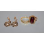 A pair of 9ct gold pierced disc ear studs, an 18ct gold Greek key pattern ring and a cabochon