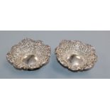 A pair of late Victorian pierced silver bonbon dishes, Henry Matthews, Birmingham, 1894, 11.5cm.