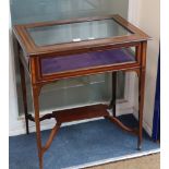 An Edwardian inlaid mahogany display table, with bevelled glazing and understage, W.2ft 8in. D.1ft