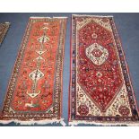 A Persian red ground runner and one other Largest 197 x 83cm