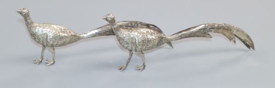 A pair of early 20th century Hanau silver model peacocks, import marks for Chester, 1902, (one