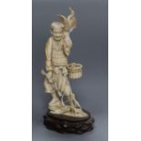 A Japanese ivory figure of a cormorant fisherman, early 20th century height 24cm