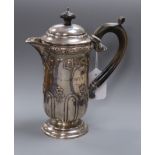 A late Victorian silver hotwater pot, Birmingham, 1900, gross 11 oz.