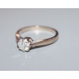 A modern 18ct white gold and solitaire diamond ring, size J.