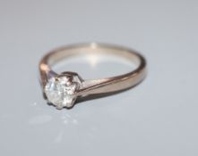 A modern 18ct white gold and solitaire diamond ring, size J.