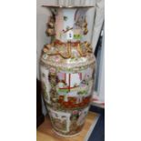 A Canton famille rose large floor vase decorated with panels of figures and flowers height 94cm