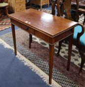 An early 19th century rectangular mahogany folding tea table W.91cm