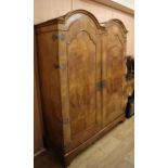 A 1920's Queen Anne style figured walnut wardrobe Wardrobe W.158cm