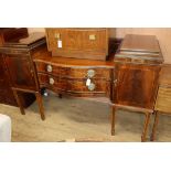 An Edwardian inlaid mahogany serpentine fronted sideboard W.167.5cm