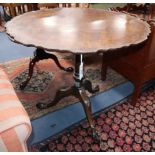 A Georgian style mahogany piecrust tilt top table Diameter 80cm