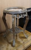 A Chinese marble topped jardiniere stand 35cm diameter