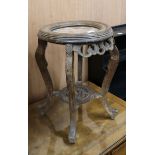 A Chinese marble topped jardiniere stand 35cm diameter