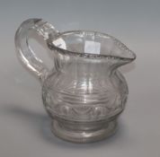 A late Georgian Irish glass jug height 19cm