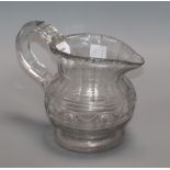 A late Georgian Irish glass jug height 19cm