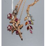 A 9ct gold, ruby and diamond set floral spray brooch and a 9ct gold and gem set pendant on a 9ct