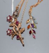 A 9ct gold, ruby and diamond set floral spray brooch and a 9ct gold and gem set pendant on a 9ct