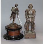 An athletic figure on stand and a commemorative figure dated 1948