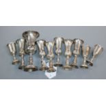 Eleven assorted silver kiddush cups, tallest 13.2cm.
