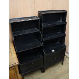 Two Regency style black painted waterfall bookcases Larger H.128cm