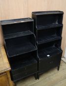 Two Regency style black painted waterfall bookcases Larger H.128cm