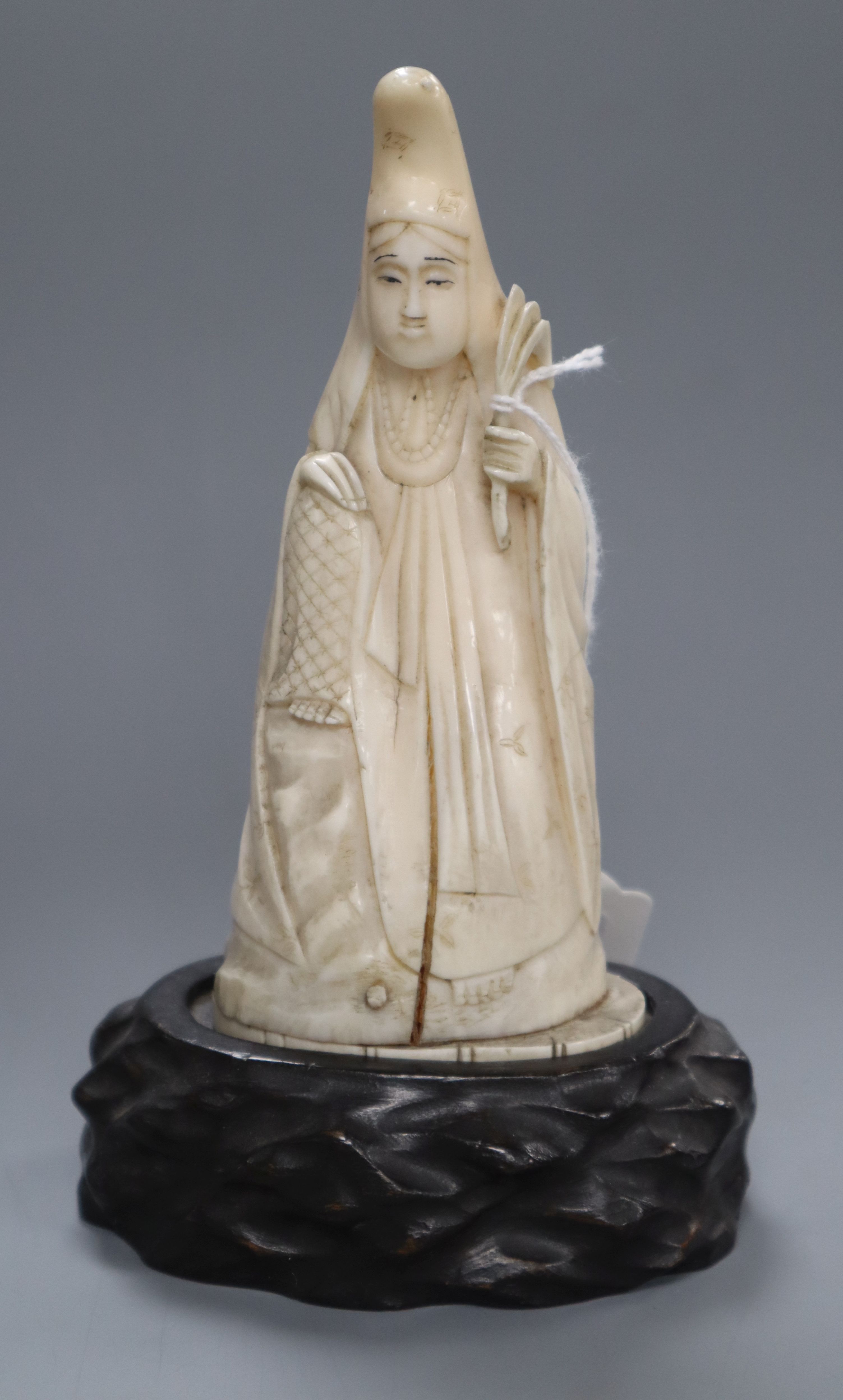 A 19th century Chinese ivory figure height 16cm