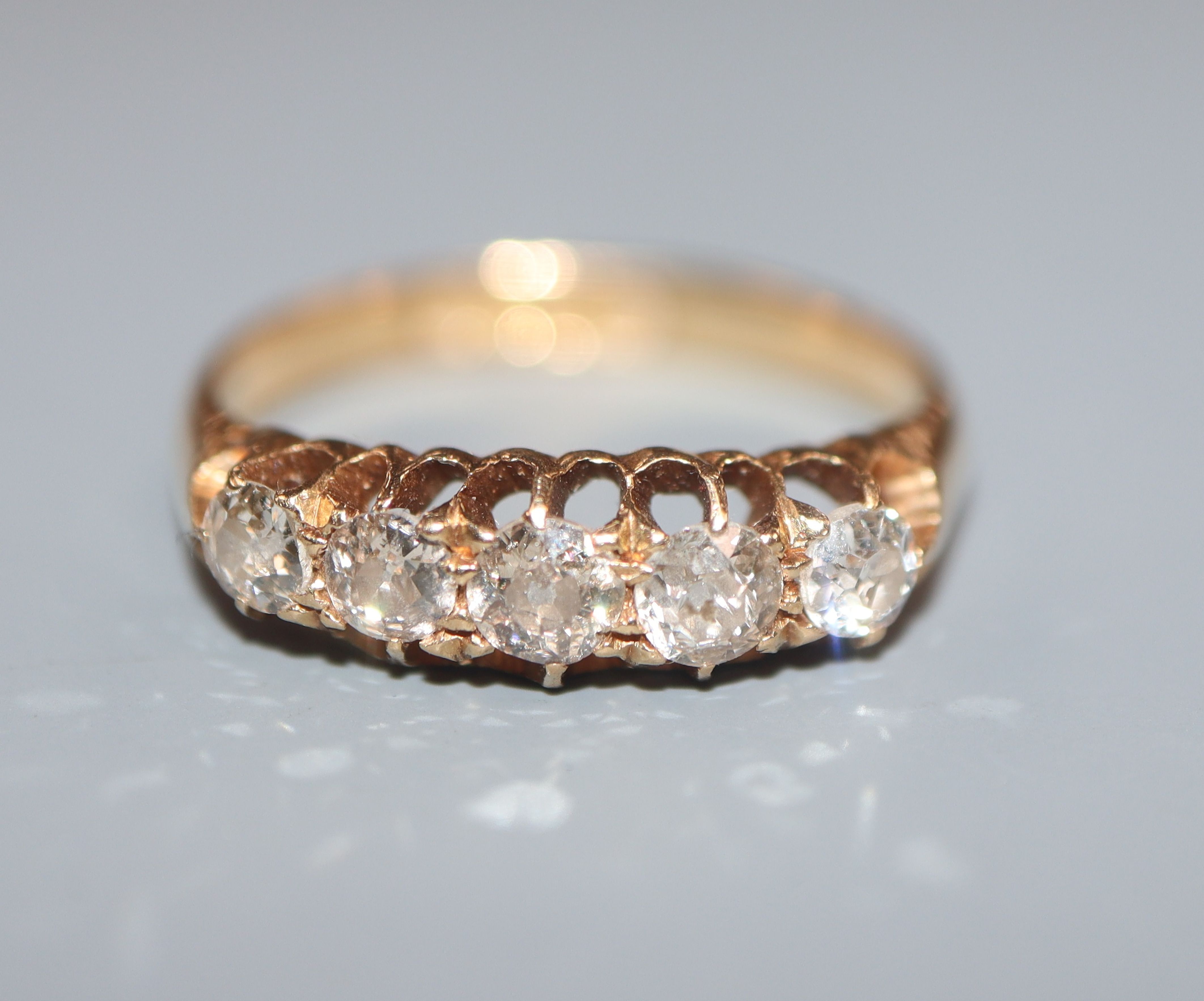 A George V 18ct gold and five stone diamond half hoop ring, size N/O. - Image 2 of 2